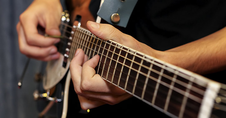 man playing guitar