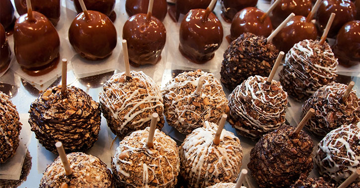 candy apples on a tray