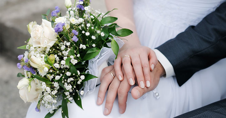 bride and groom with bouquet