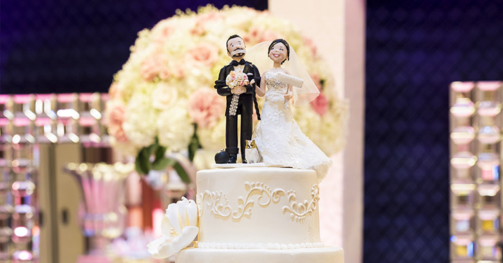 wedding cake topper with bride and groom