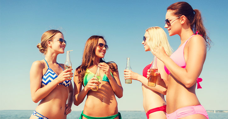 four women on the beach