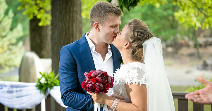 bride and groom kissing