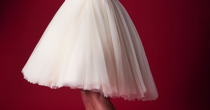 close up of a ballerina-style wedding dress