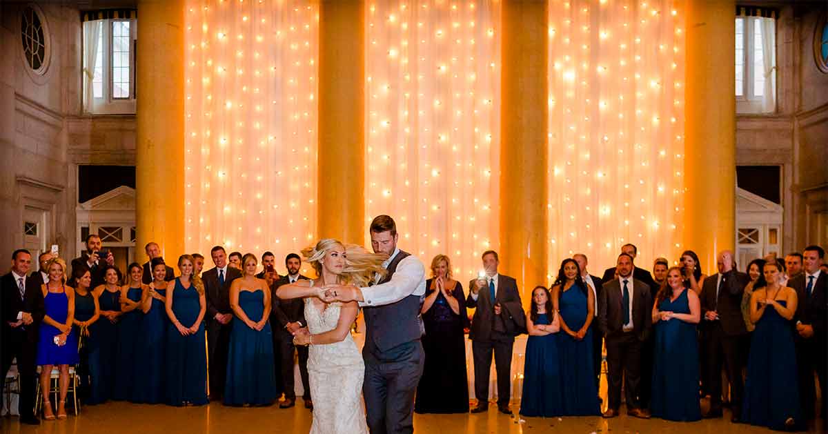 A couple's first dance in the Hall of Springs.