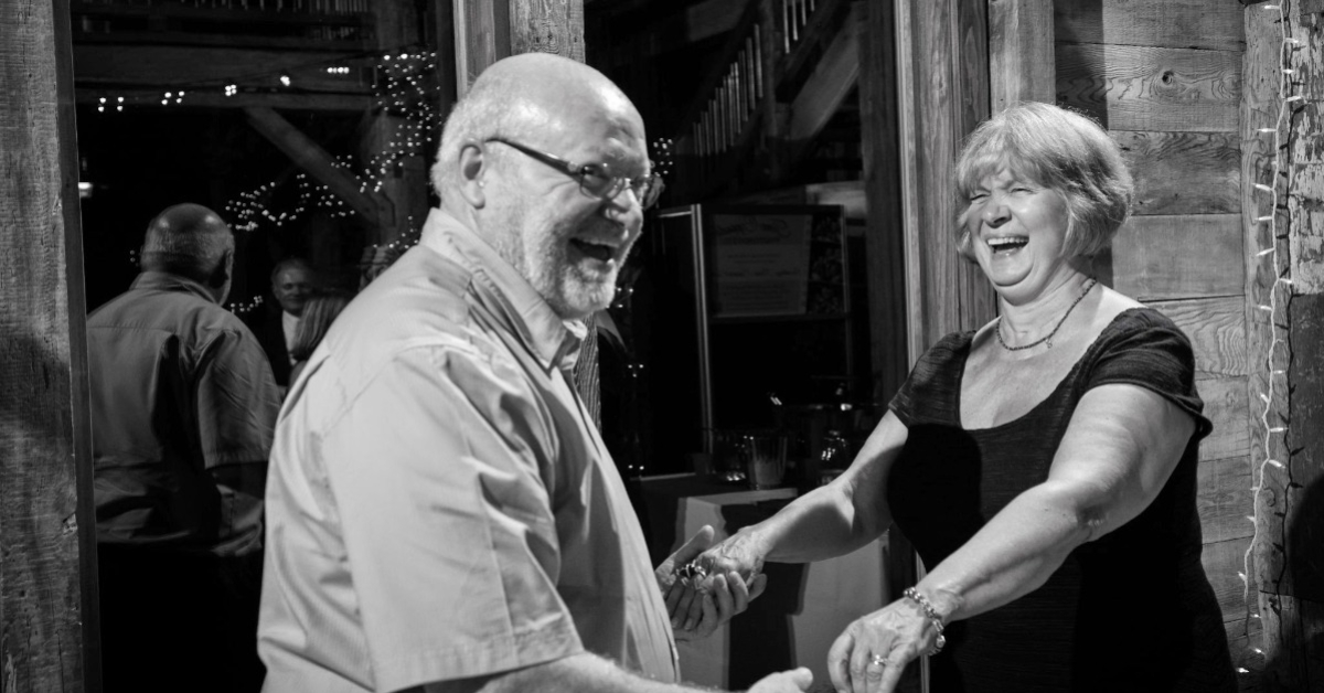 black and white photo of man and woman at a wedding